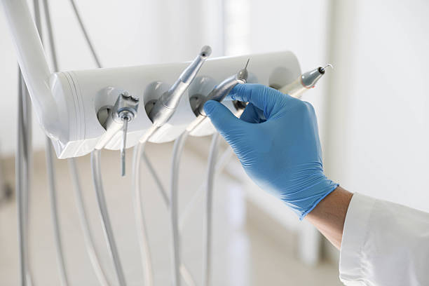 Professional Tooth Extraction technician working in Somonauk, IL